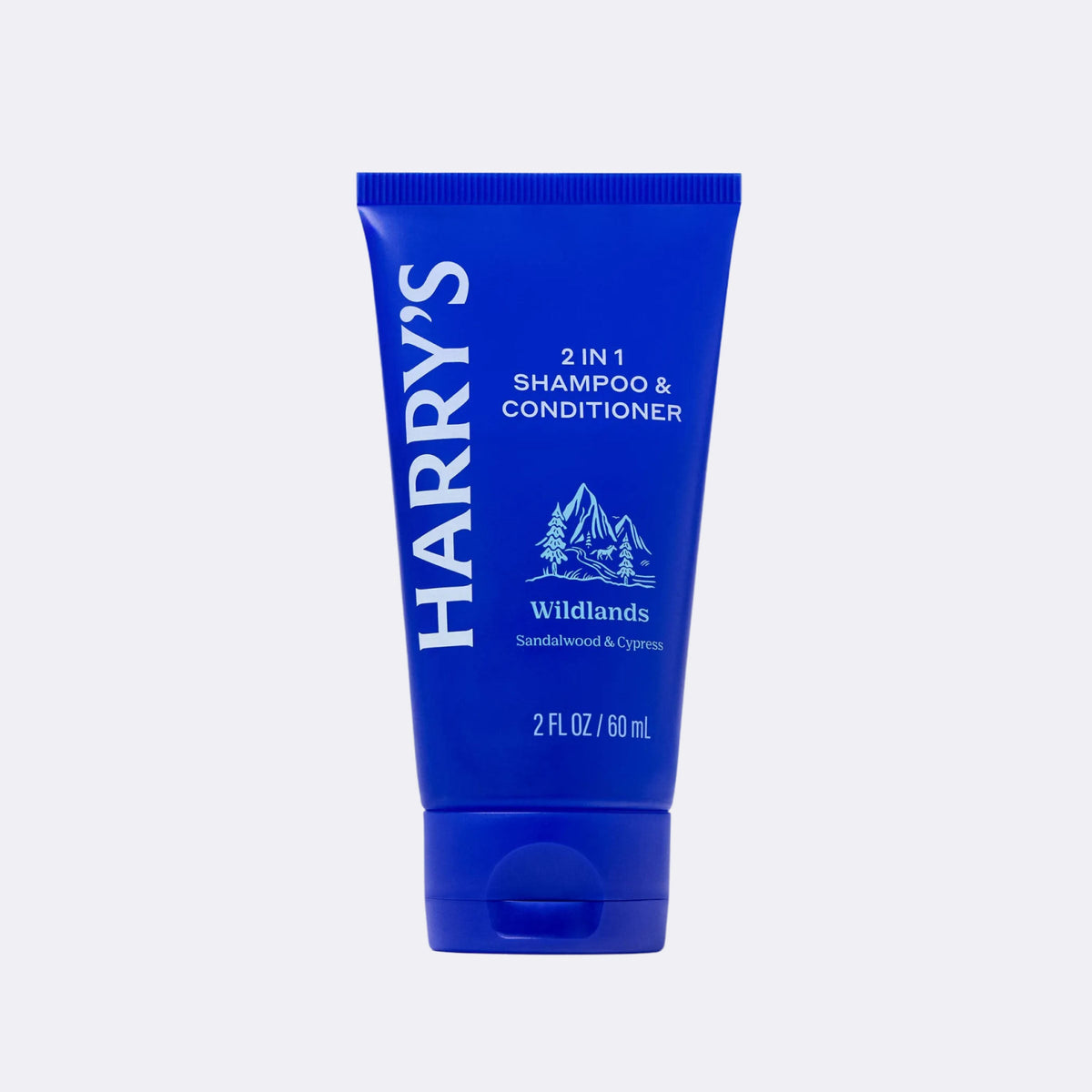 Blue tube of Harry's 2 in 1 Shampoo & Conditioner on a light gray background