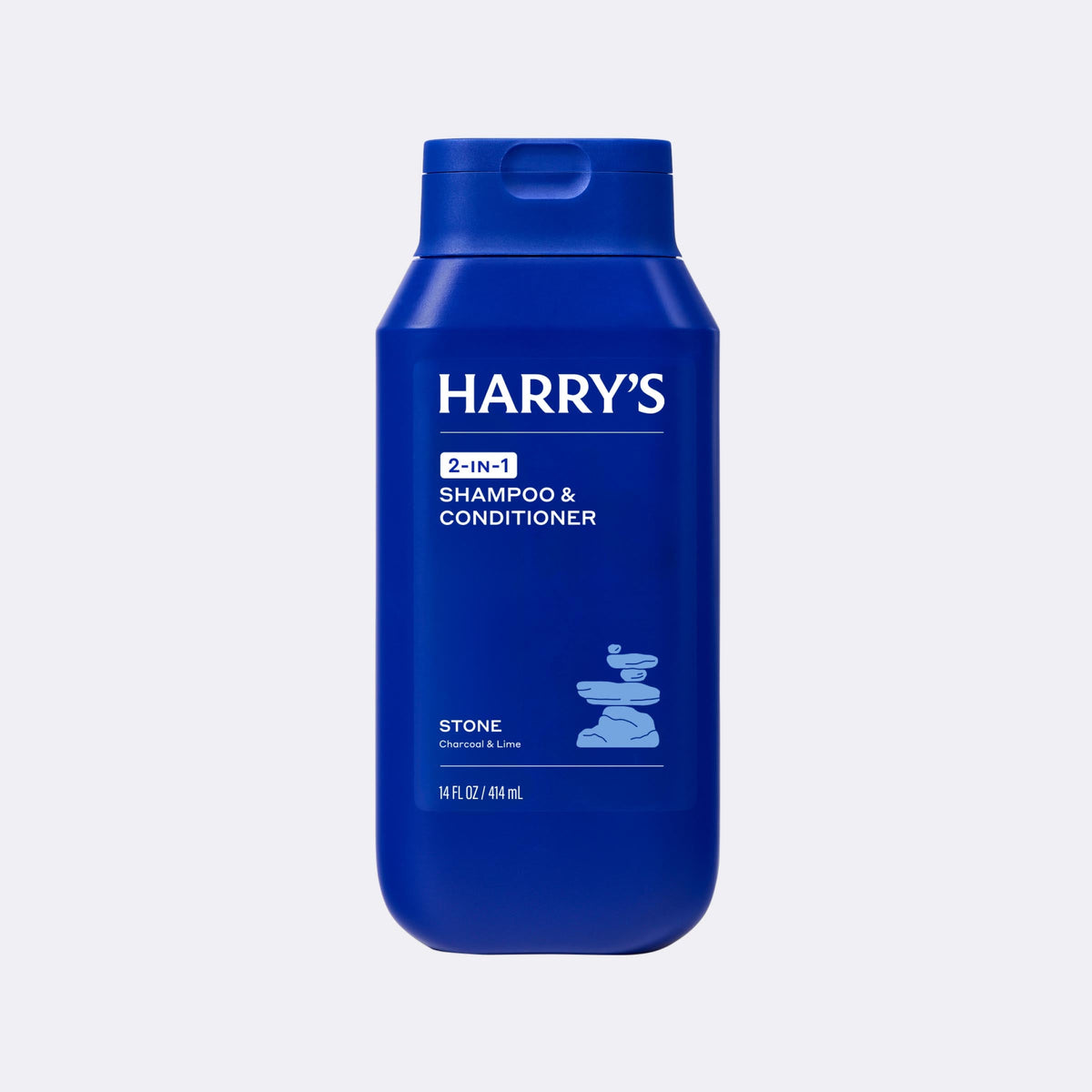 Blue bottle of Harry's 2-in-1 Shampoo & Conditioner on a light gray background