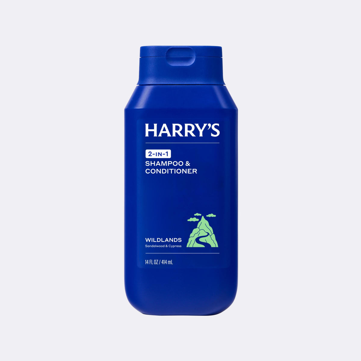 Blue bottle of Harry's 2-in-1 shampoo & conditioner on a light gray background
