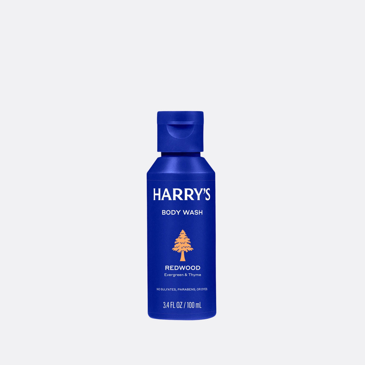 Blue bottle of Harry's Redwood body wash on a light gray background