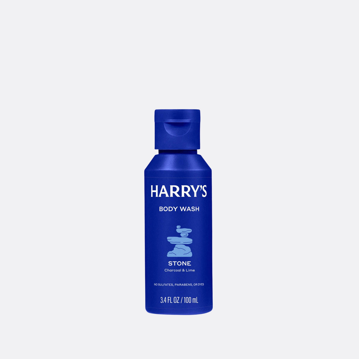 Blue bottle of Harry's body wash on a light gray background