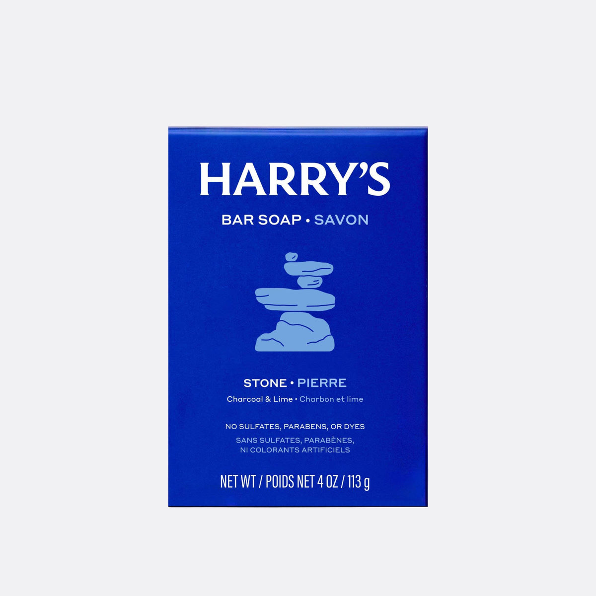 A blue rectangular box of Harry's Bar Soap in the Stone / Pierre scent, featuring white text and a light blue stacked stone graphic, centered on a light gray background.