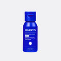 Blue bottle of Harry's daily facial lotion on a white background