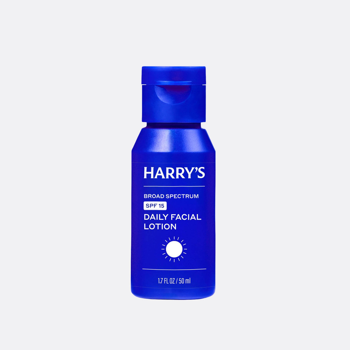 Blue bottle of Harry's daily facial lotion on a white background