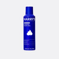 Blue bottle of Harry's foaming shave gel on a white background