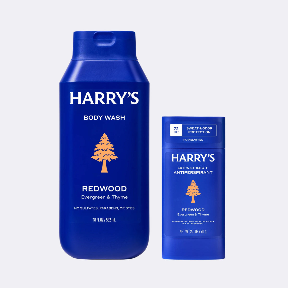 Two blue bottles of Harry's body wash and antiperspirant on a light gray background