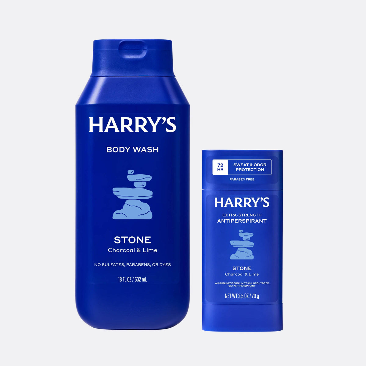 Two blue bottles of Harry's body wash and antiperspirant on a light gray background