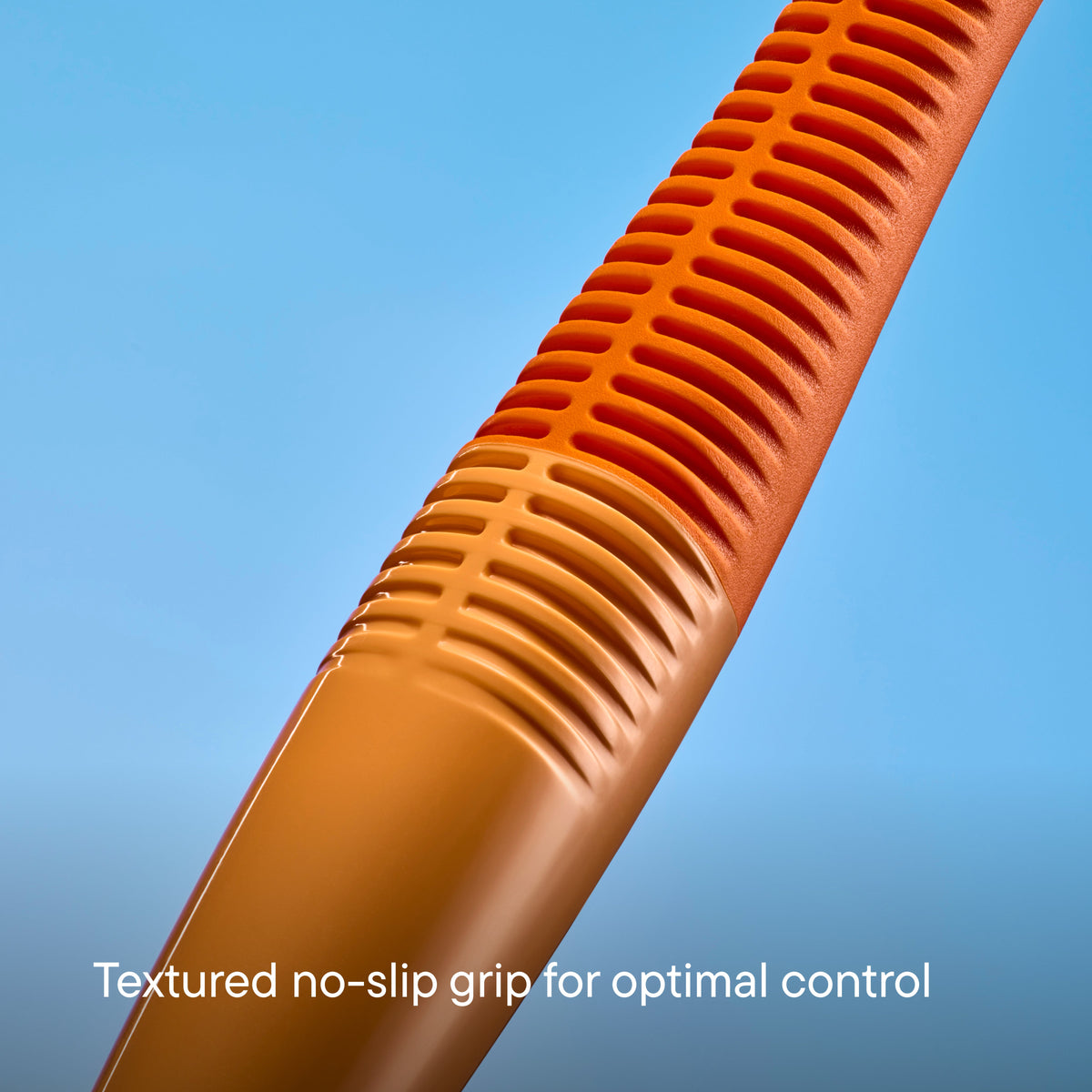 Close-up of an orange textured no-slip grip handle, shown diagonally against a solid blue background with the text 'Textured no-slip grip for optimal control' at the bottom.