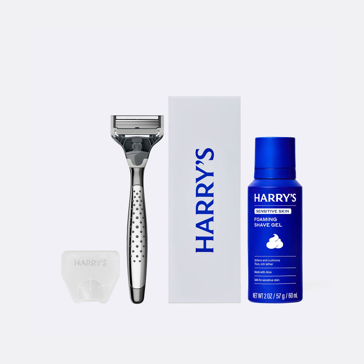 Harry's shaving kit with razor, box, and shave gel on a white background
