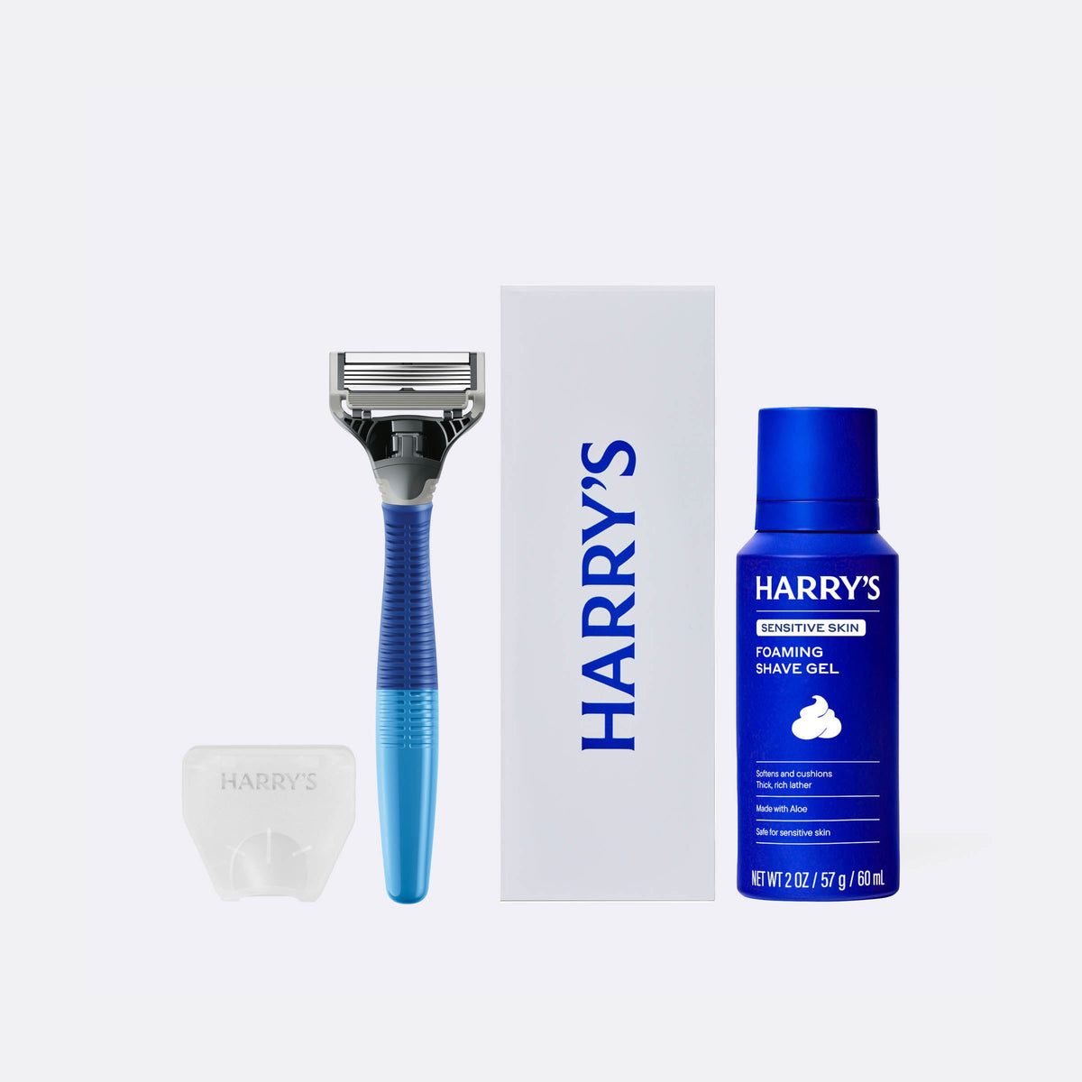 Harry's shaving kit with razor, box, and shave gel on a white background