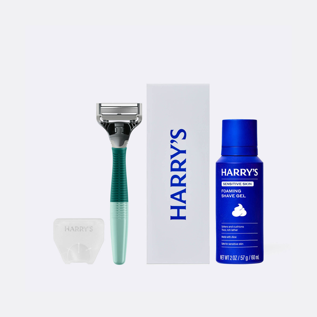 Harry's shaving kit with razor, box, and shave gel on a white background
