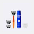 Harry's shaving product set including a razor, shave gel, and razor blade on a white background