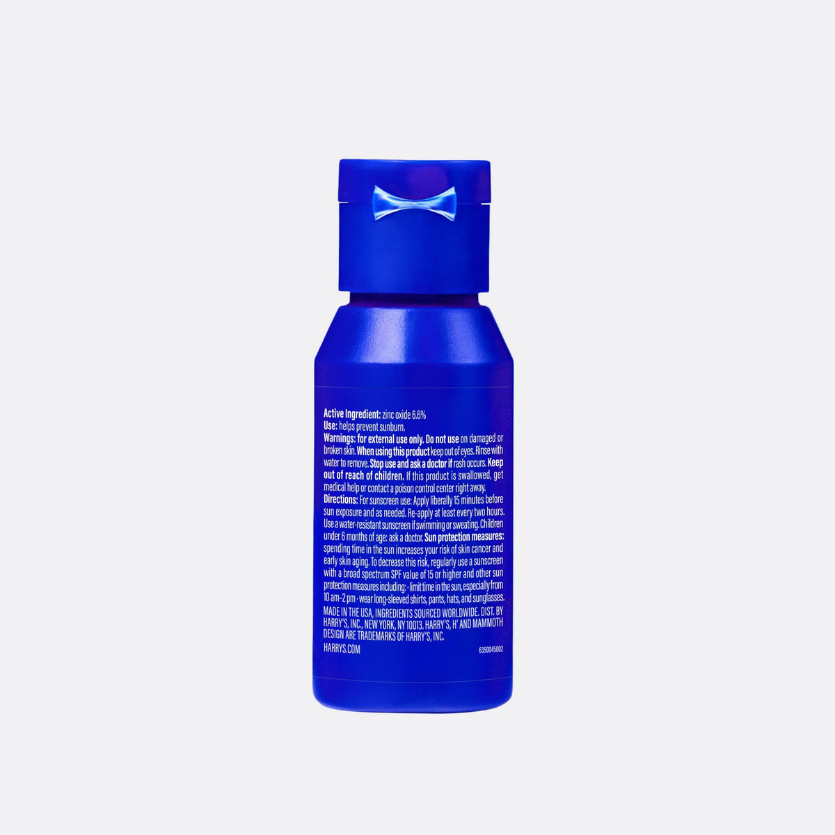 Blue bottle with text on a white background