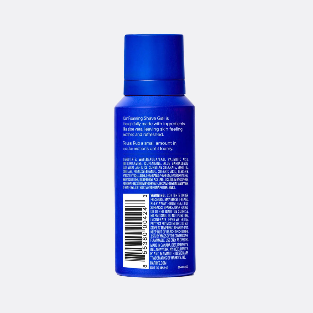 Blue bottle of shaving gel with text and a barcode on a white background