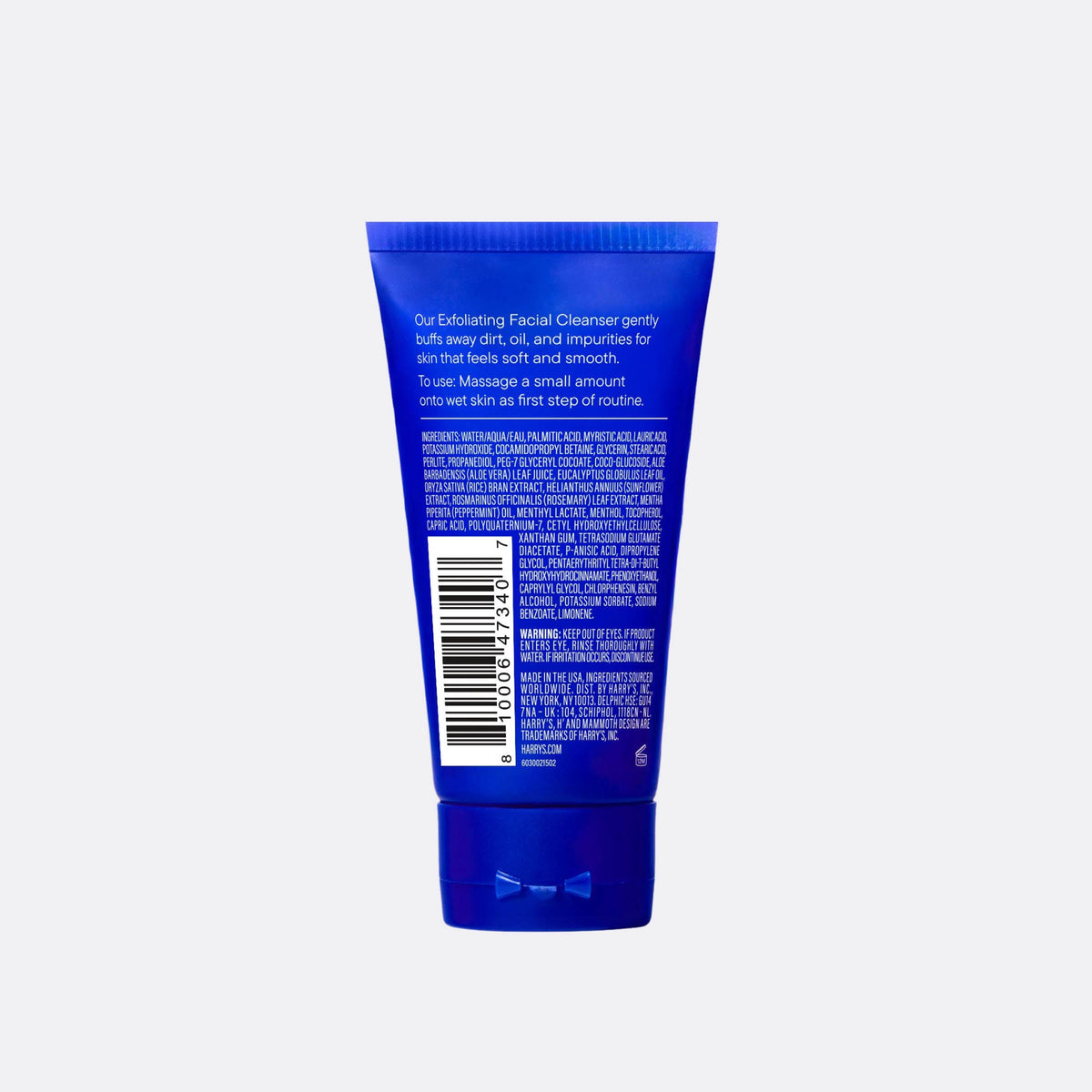 Blue tube of facial cleanser with text and a barcode on a white background