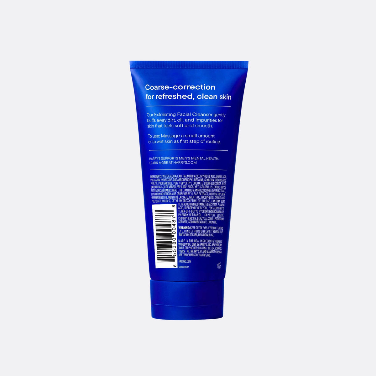 Blue tube of facial cleanser with text on a white background