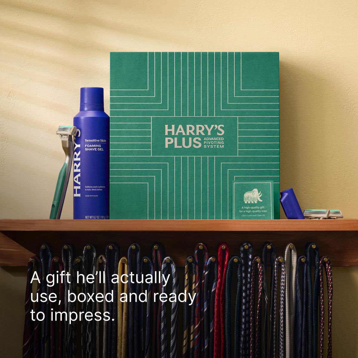 Harry's grooming kit with shaving gel, box, and razor on a shelf.