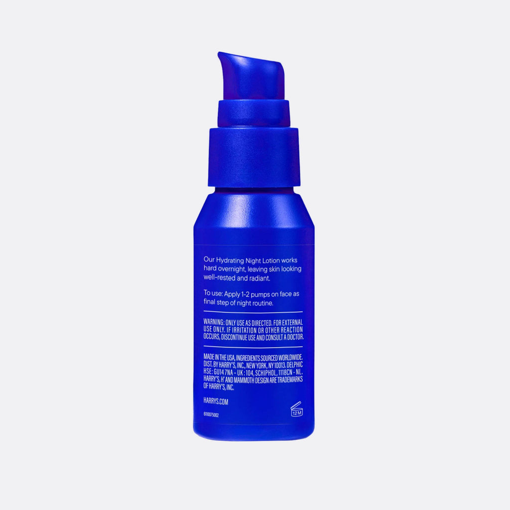 Blue skincare bottle with text on a light gray background
