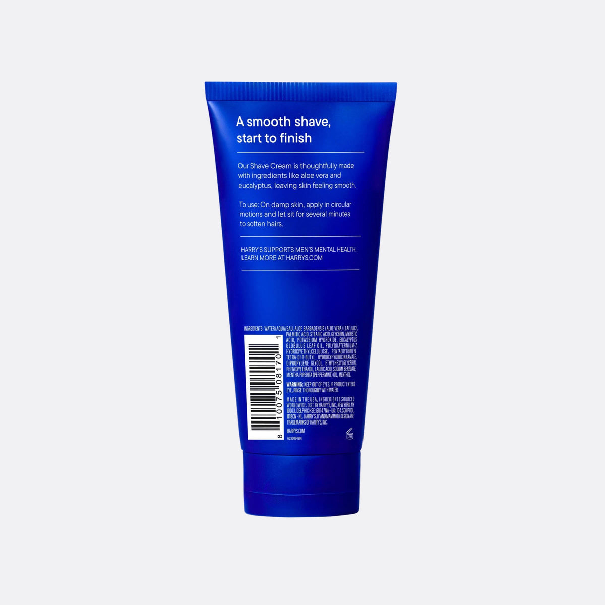 Blue tube of shaving cream with text on a white background