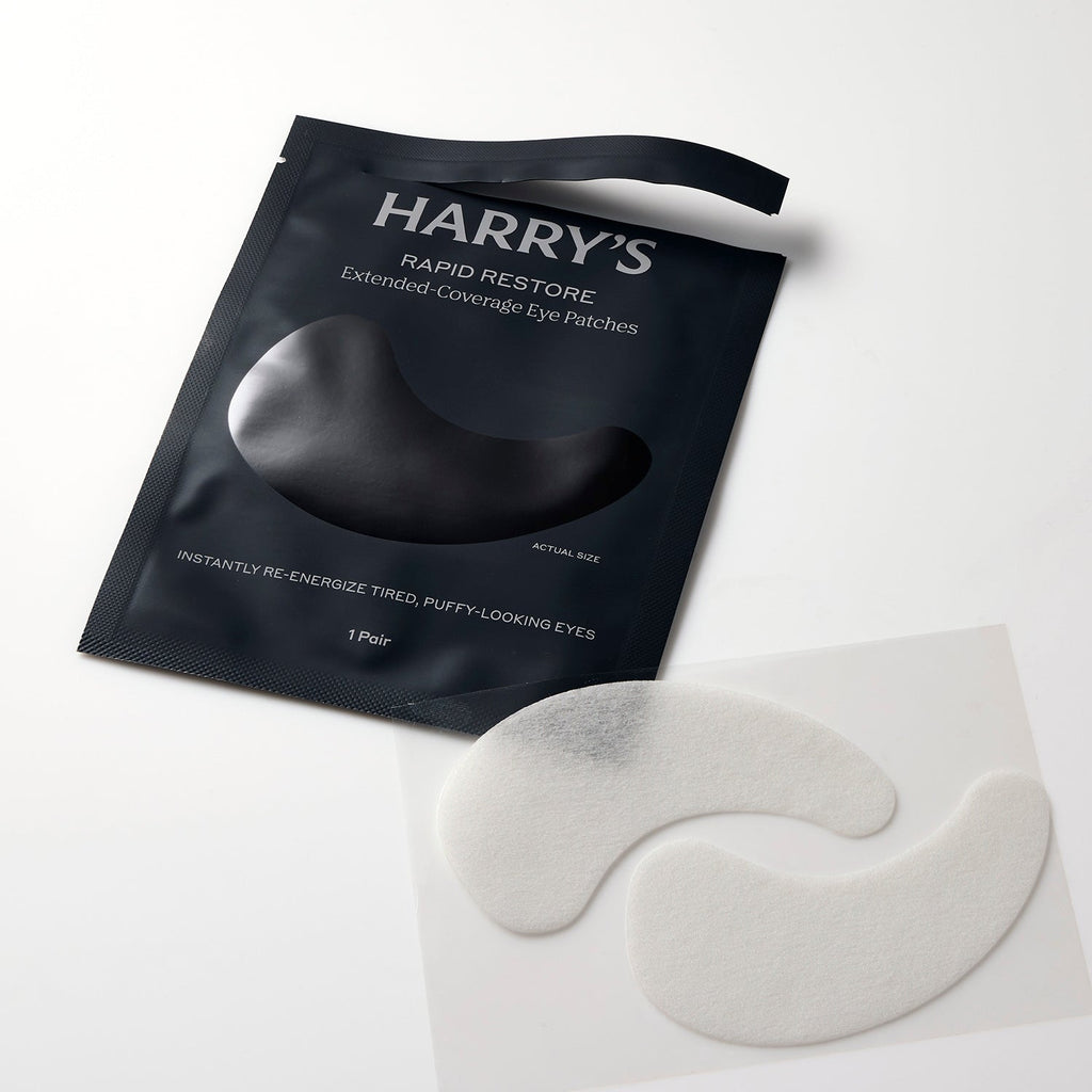 HARRY'S Rapid Restore eye patches with packaging on a white background