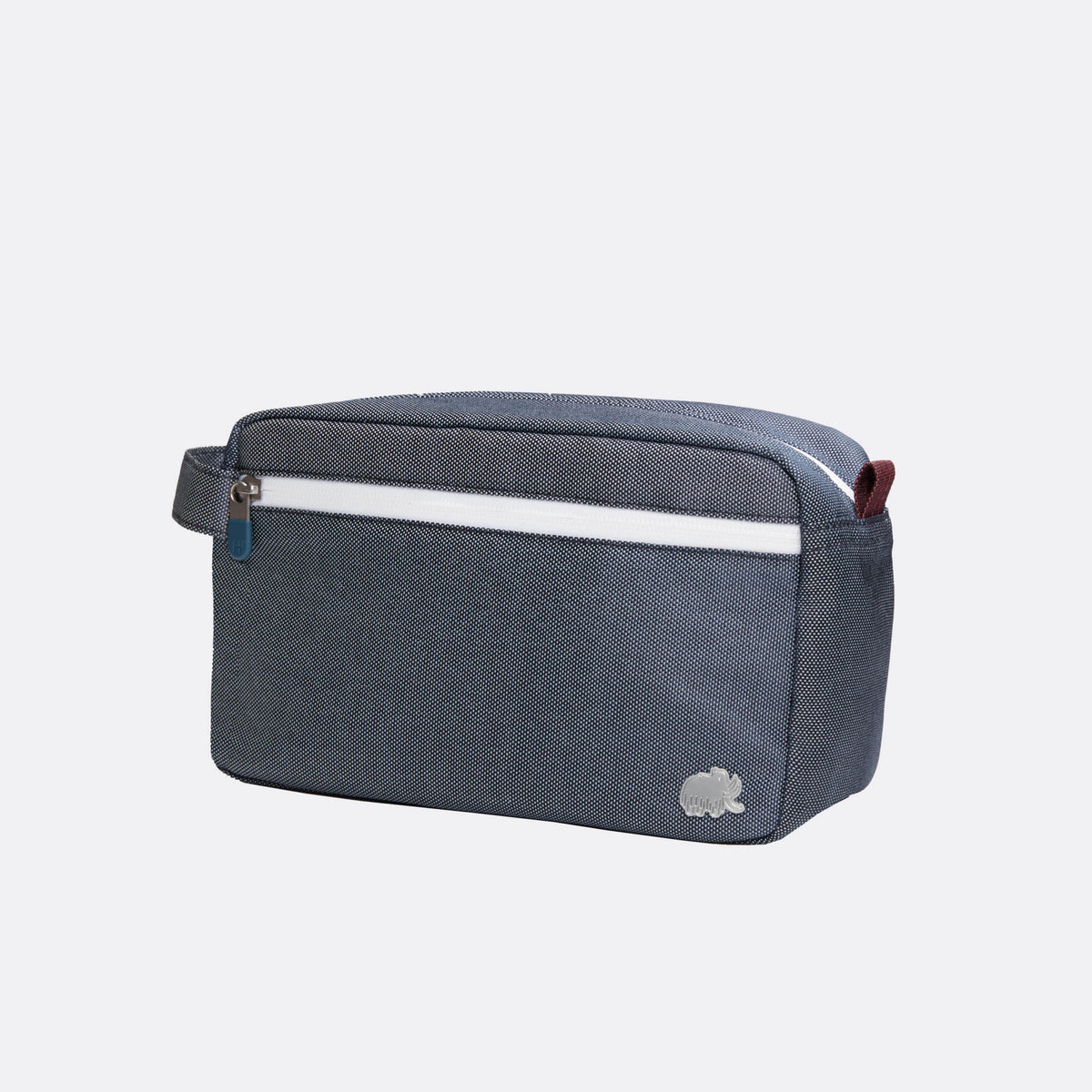 Gray toiletry bag with a white stripe on a light gray background