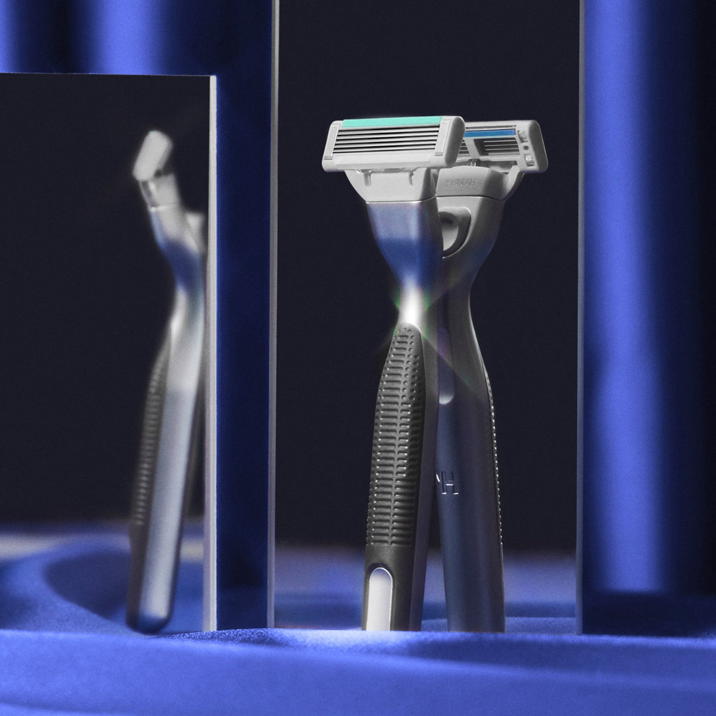 Shaving razor with a blue gradient background