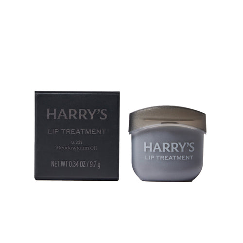 Harry's lip treatment jar and packaging on a white background