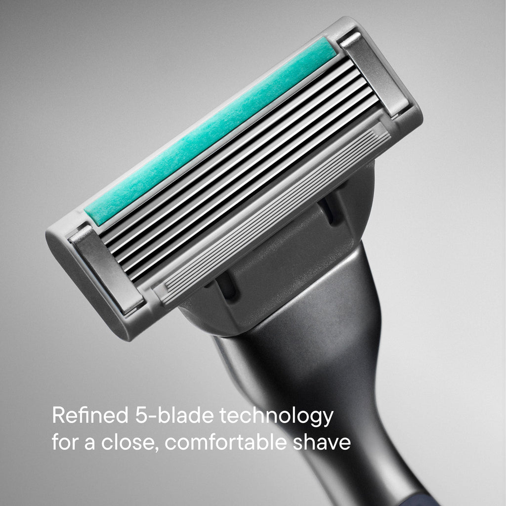Shaving razor with 5 blades on a gray background
