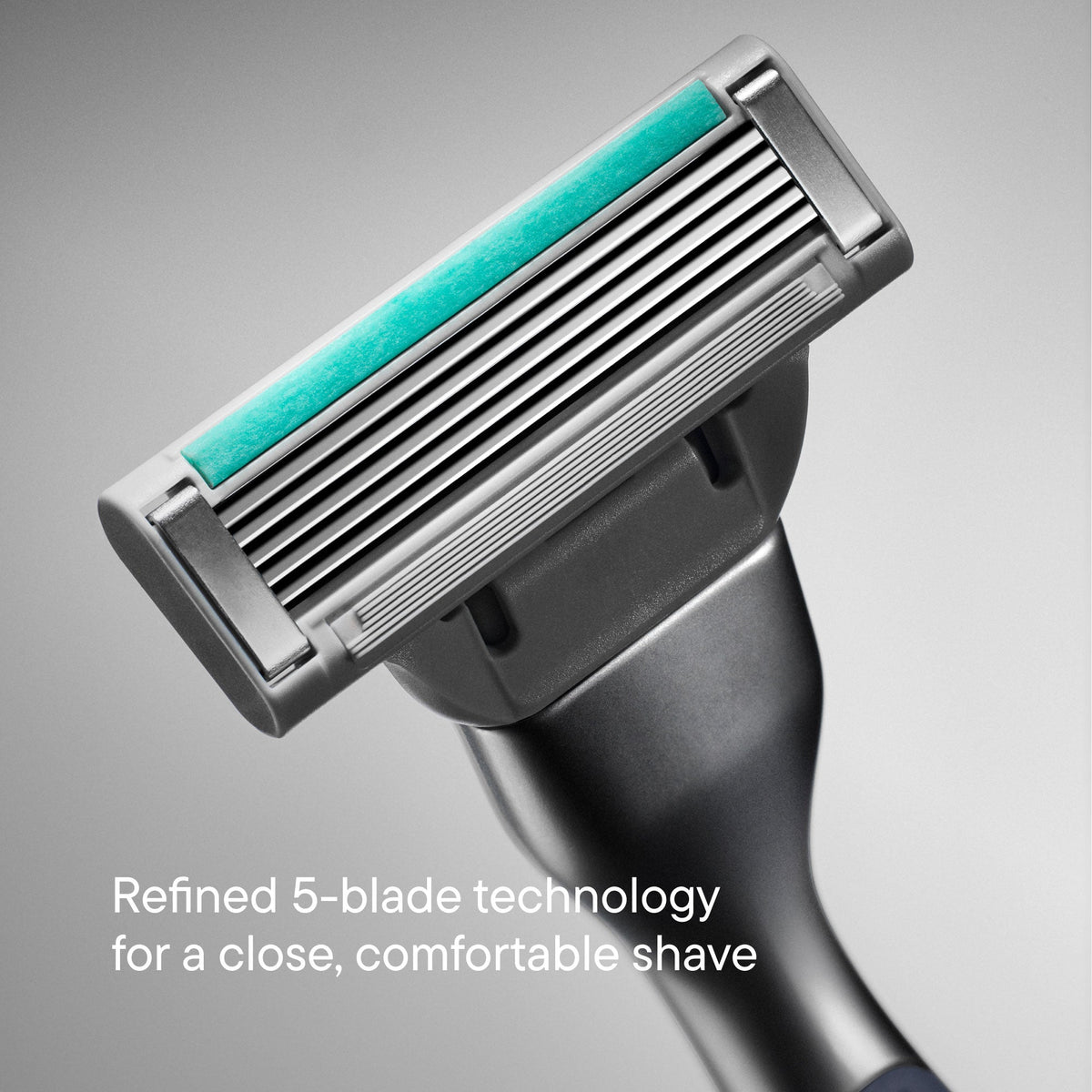 Shaving razor with 5 blades on a gray background