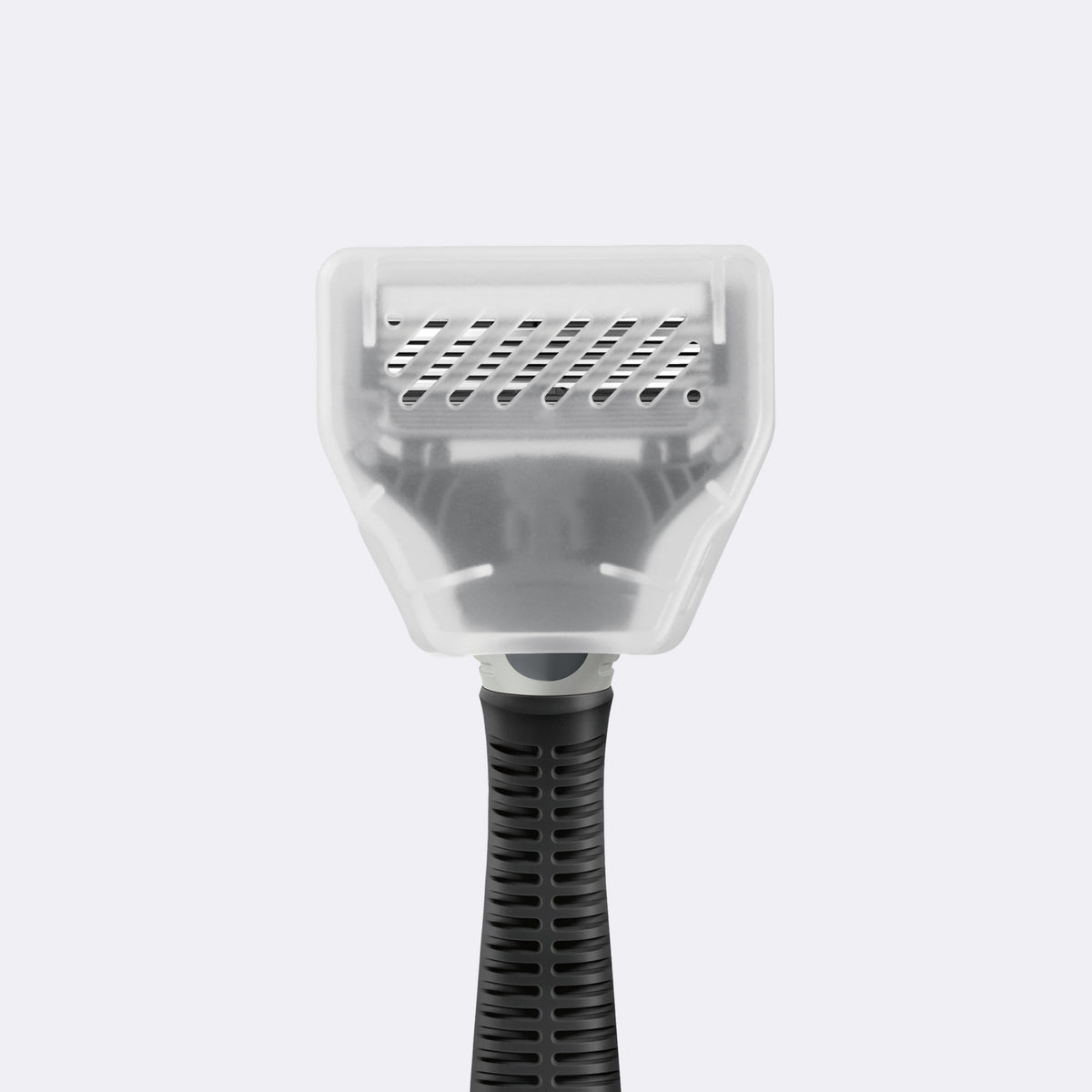 Charcoal Truman razor with the Travel Blade Cover on a white background.