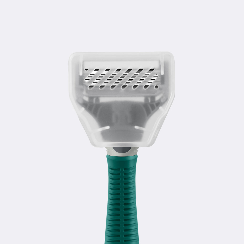 Sage Truman razor with the Travel Blade Cover on a white background.