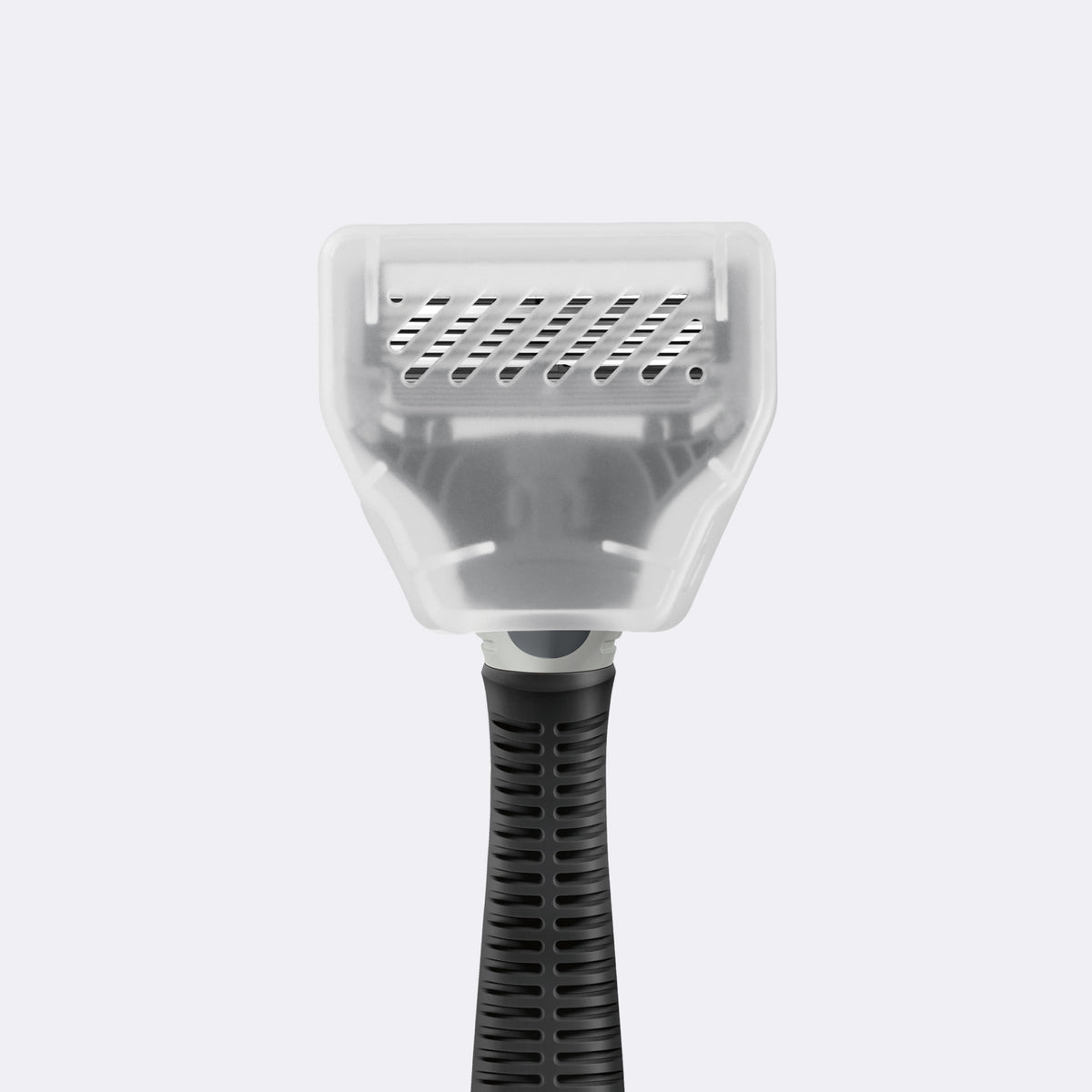 Close up of the bade covered by the clear plastic Travel Blade Cover.