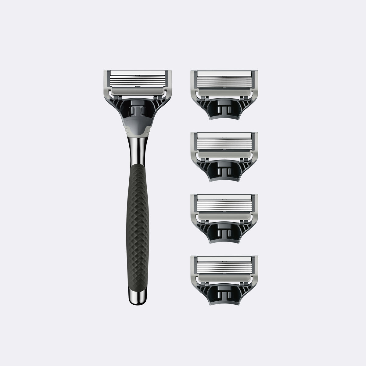 Shaving razor with four razor heads on a light gray background