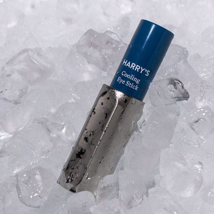 Cooling eye stick with blue cap on a bed of ice