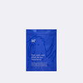 Blue package with text on a light purple background