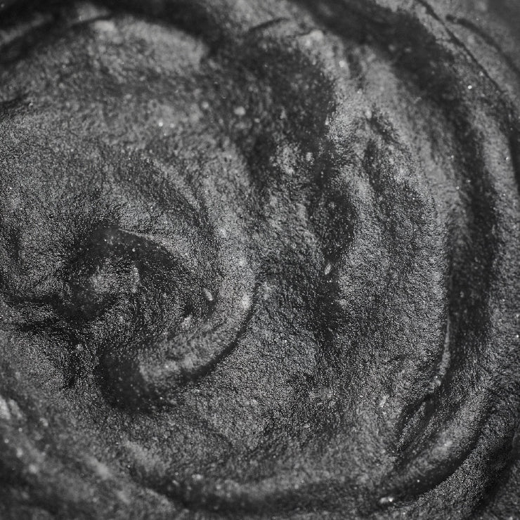 Close-up of a Tattoo Frost's textured black surface with swirling patterns