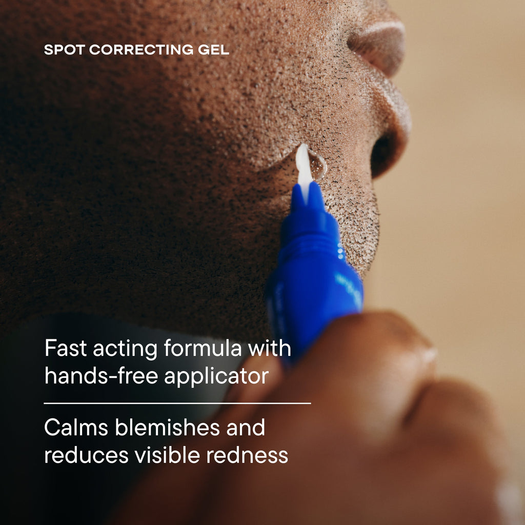 Person applying spot correcting gel to their skin with a blue applicator.