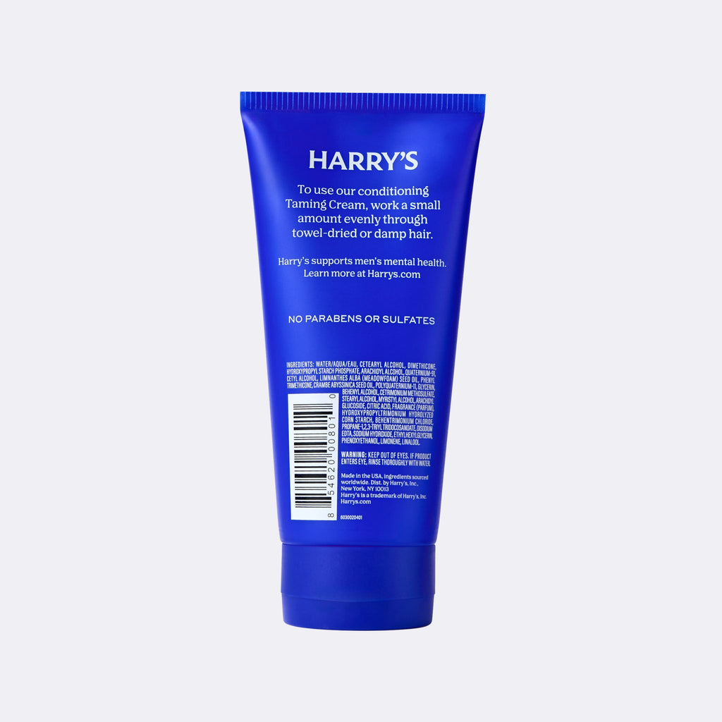 Blue tube of Harry's hair product on a white background