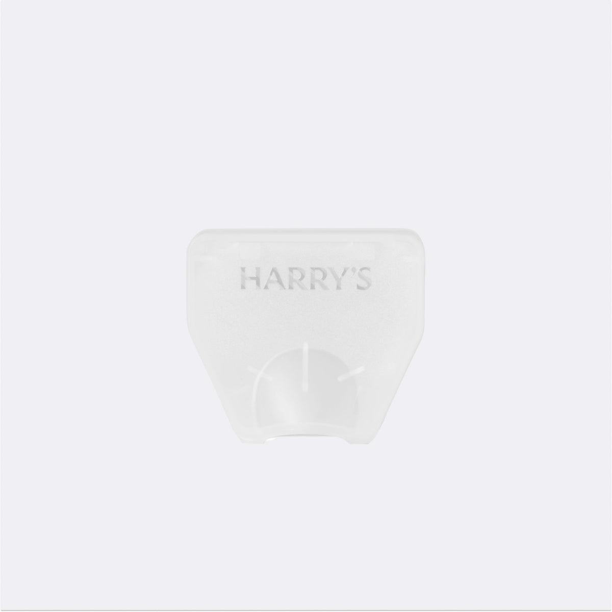 Clear plastic container with 'HARRY'S' branding on a white background