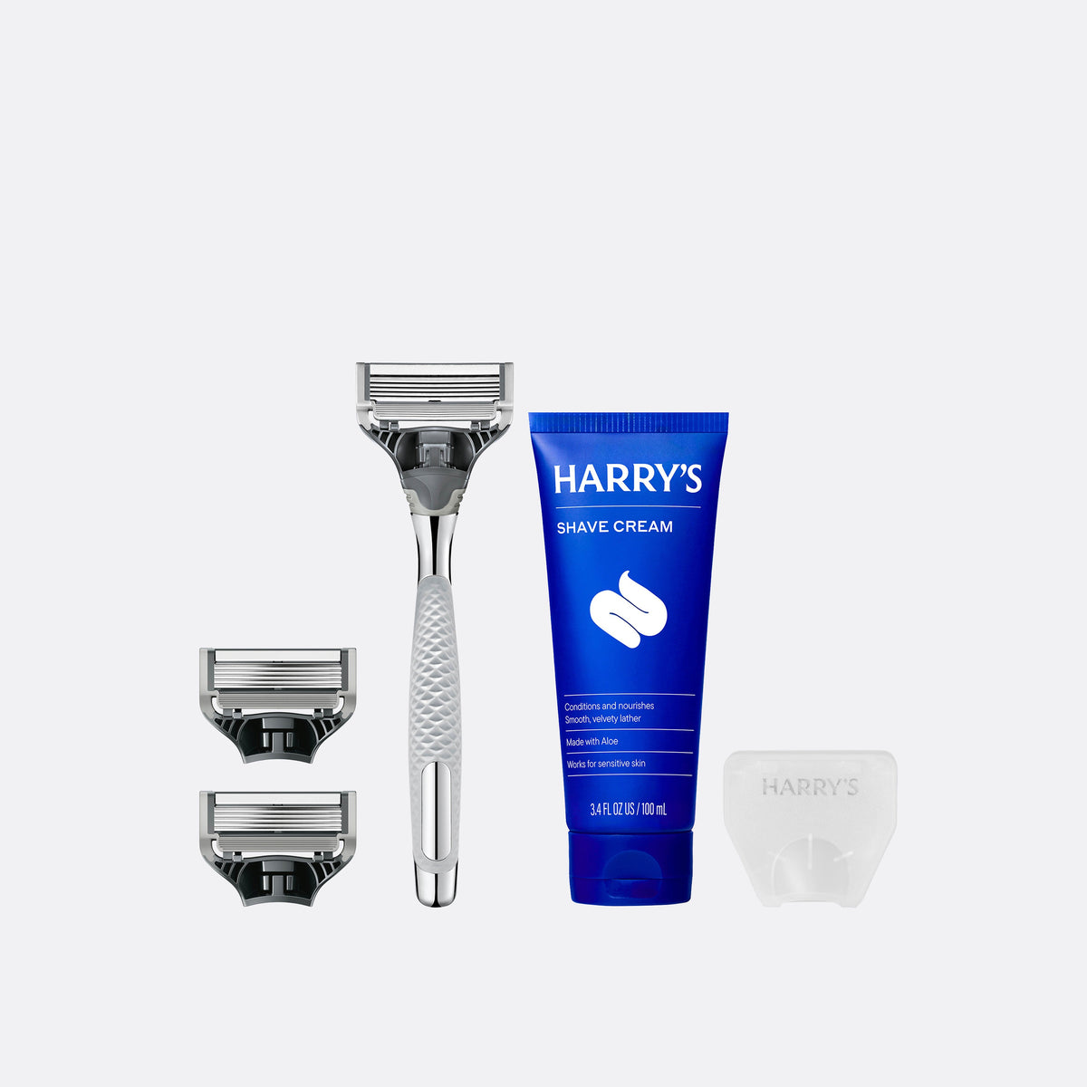 Two blades, Chrome Winston razor, shave cream and the Travel Blade cover.